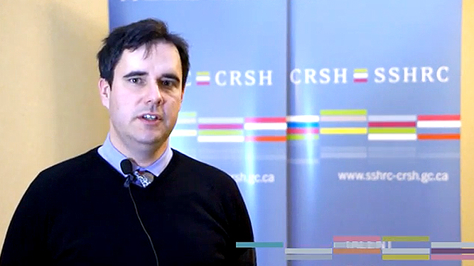 Video still of Benoit Dostie explaining his research on the subject of Investing in Human Capital