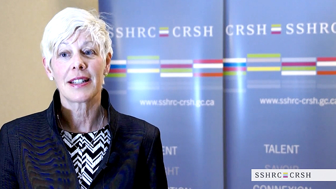 Video still of Catherine Elliott explaining her research on the subject of Leveraging Mentoring